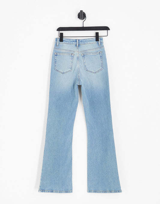 ASOS DESIGN mid rise flare jeans in light blue