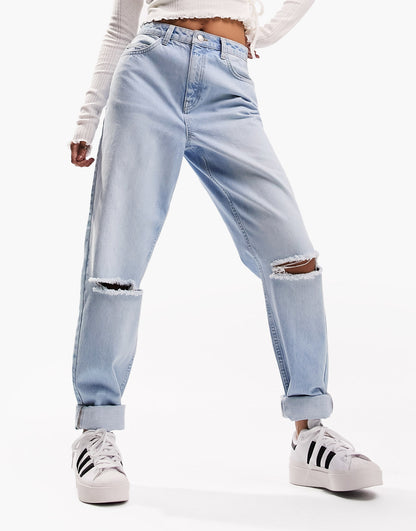 ASOS DESIGN high rise relaxed mom jean in light blue with knee rips