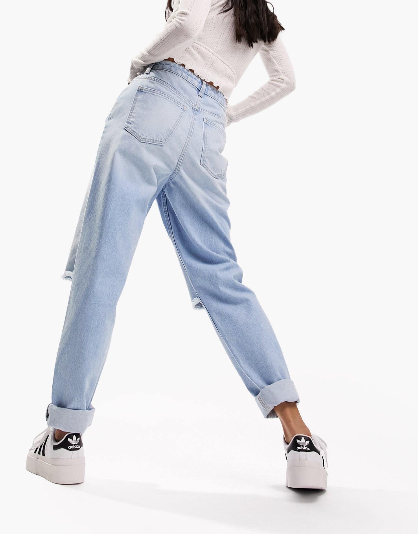 ASOS DESIGN high rise relaxed mom jean in light blue with knee rips