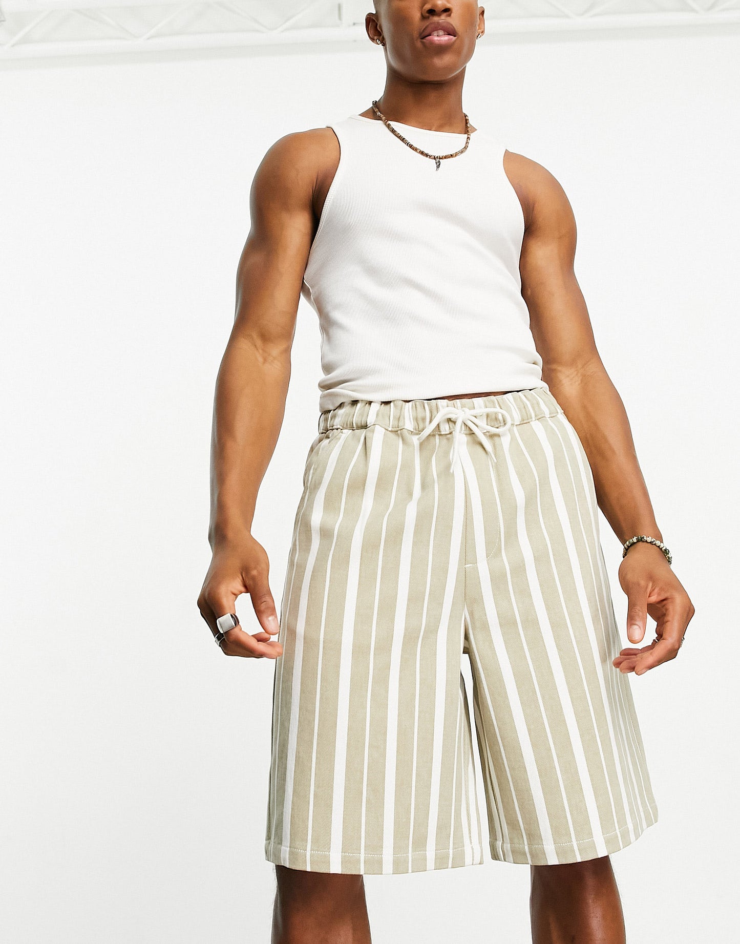 ASOS DESIGN skater textured shorts in longer length in tan stripe