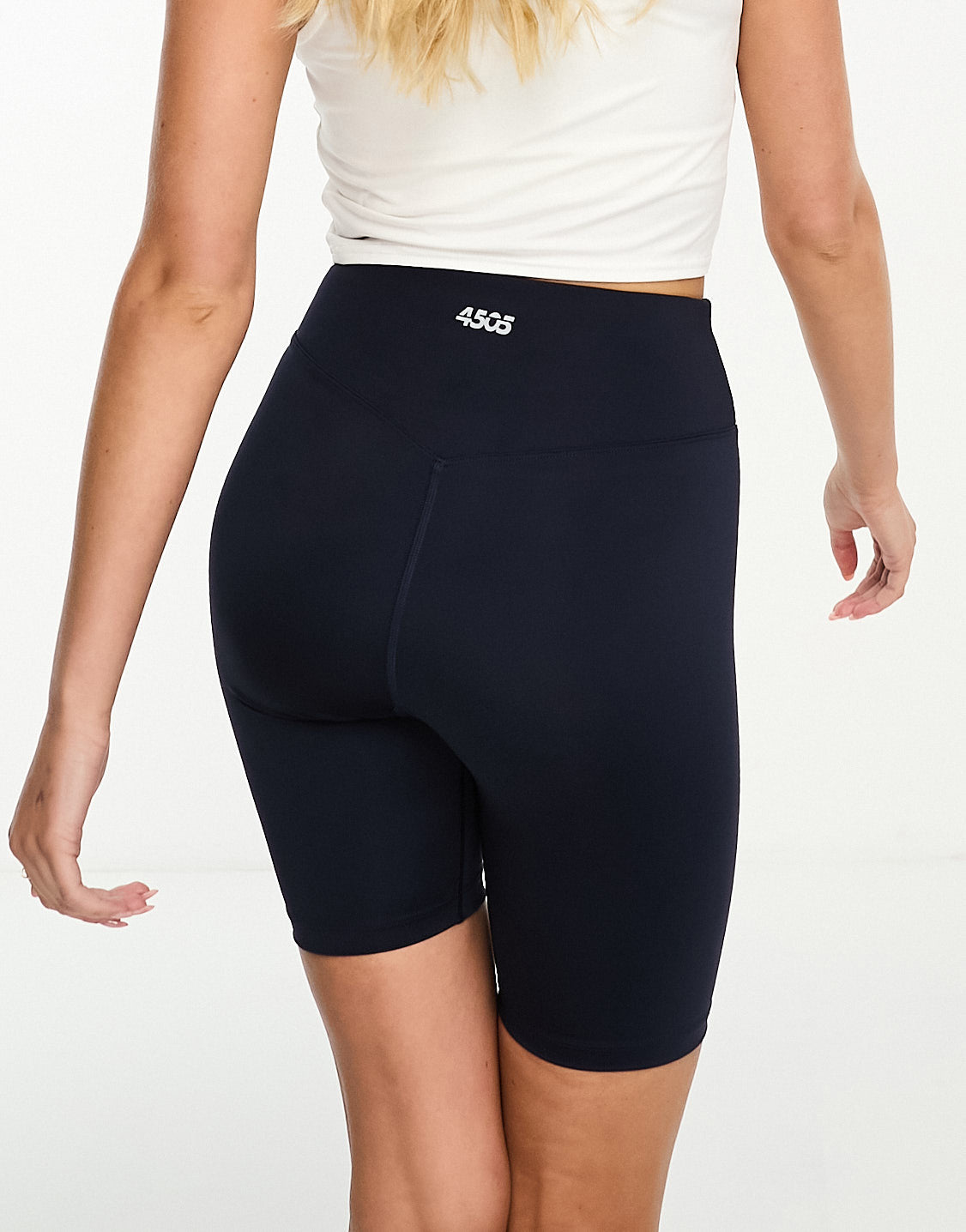 4505 Icon 8 inch legging short with bum sculpt detail in performance fabric in navy