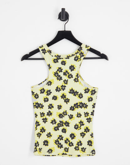 Noisy May vest in black & yellow floral