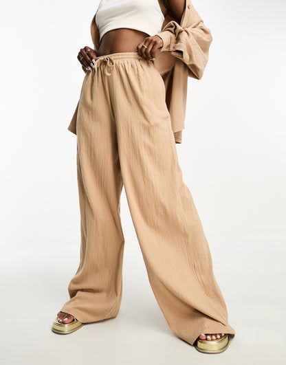 ASOS DESIGN co-ord crinkle shirred waist wide leg trouser in stone