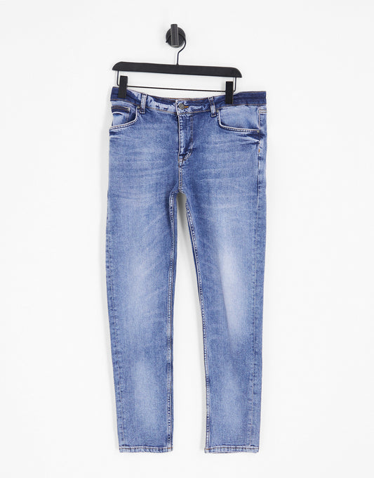 ASOS DESIGN skinny jeans in Y2k tinted mid wash blue