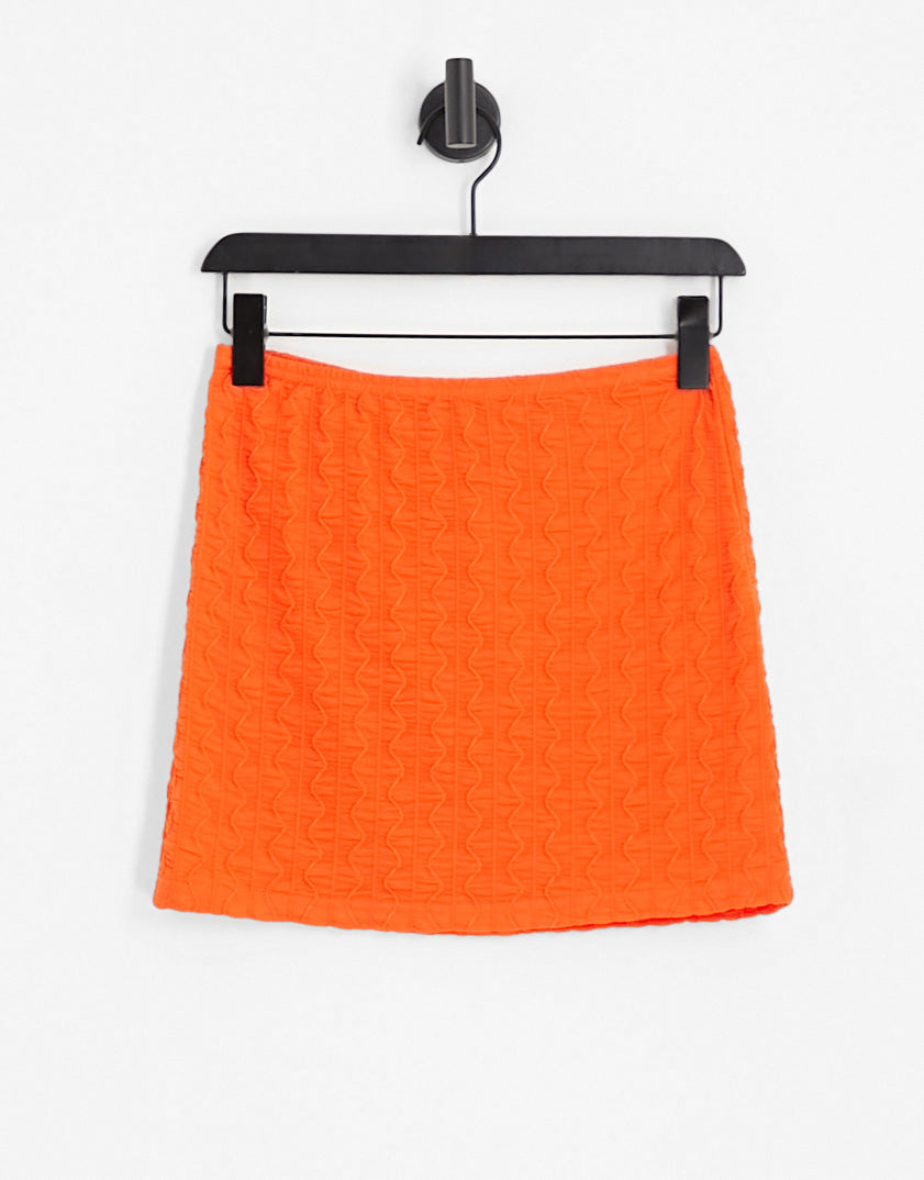 Neon & Nylon textured mini skirt co-ord in orange