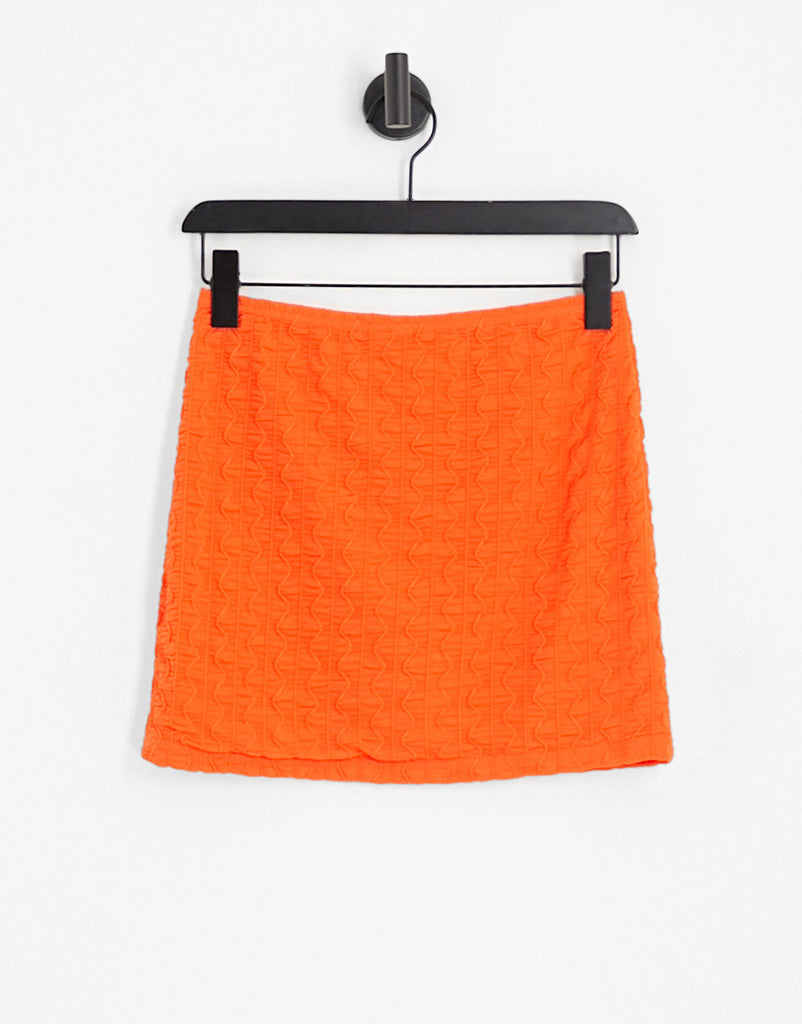 Neon & Nylon textured mini skirt co-ord in orange