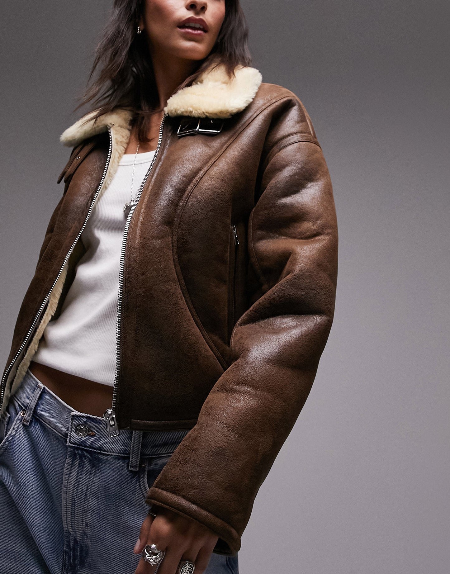 Topshop faux leather shearling cropped aviator jacket with seaming detail in dark brown