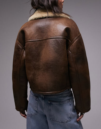 Topshop faux leather shearling cropped aviator jacket with seaming detail in dark brown