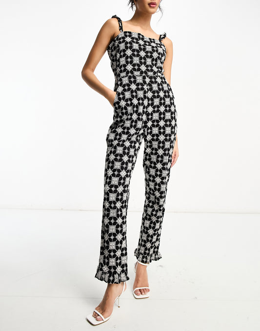 Never Fully Dressed broderie jumpsuit in monochrome print