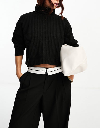 ASOS DESIGN boxy jumper in rib with roll neck in black