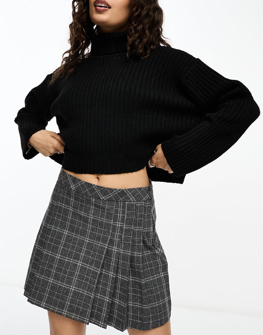 ASOS DESIGN Petite boxy jumper in rib with roll neck in black