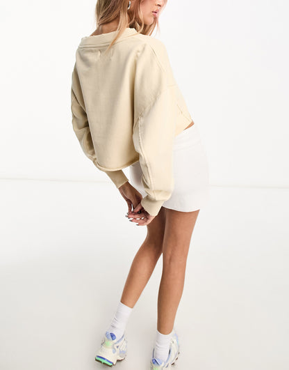 Calvin Klein Jeans cropped crew neck seaming sweatshirt in beige - exclusive to ASOS