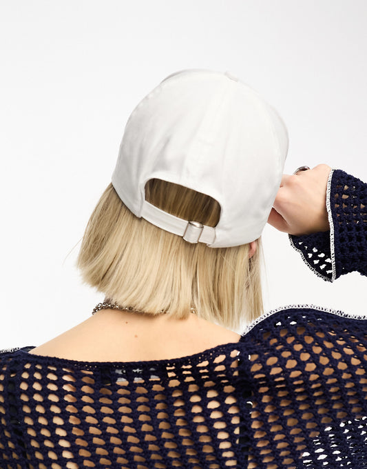 ASOS DESIGN slogan cap in white