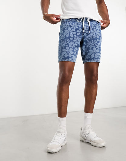 ASOS DESIGN skinny fit regular length denim shorts with flower print in mid wash blue