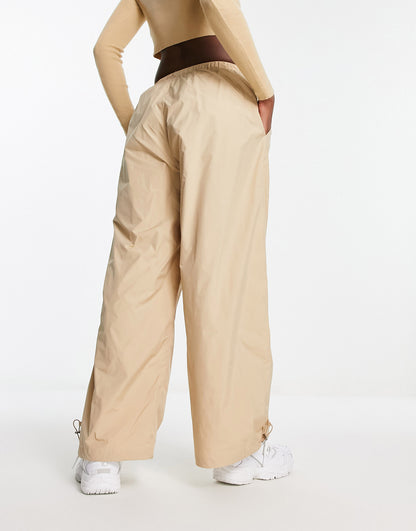 Sixth June low waist nylon parachute trousers in beige