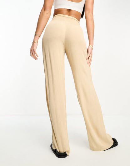 Vero Moda Tall shirred waist beach trousers in beige