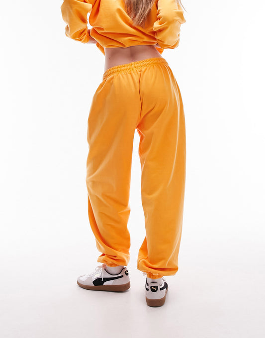 Topshop co-ord nyc project puff printed vintage wash oversized jogger in orange