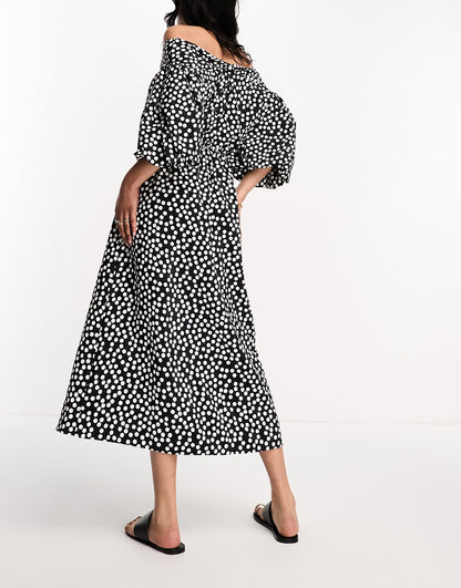 River Island puff sleeve midi dress in black polka dot