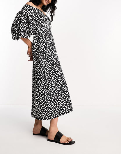 River Island puff sleeve midi dress in black polka dot