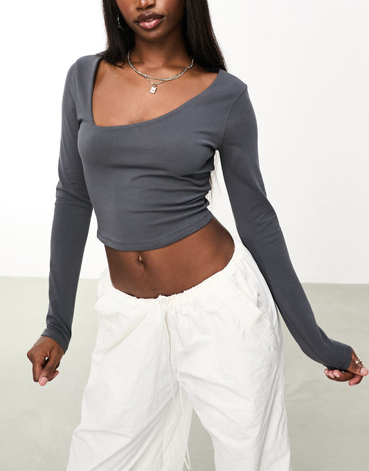 ASOS DESIGN cotton asymmetric scooped neck long sleeved crop top in charcoal