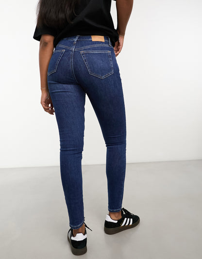 Weekday Spare mid rise skinny jeans in blue