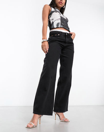 Weekday Ample low waist loose fit straight leg jeans in Black rinse