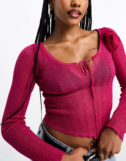 ASOS DESIGN sheer knitted top with rose corsage in pink