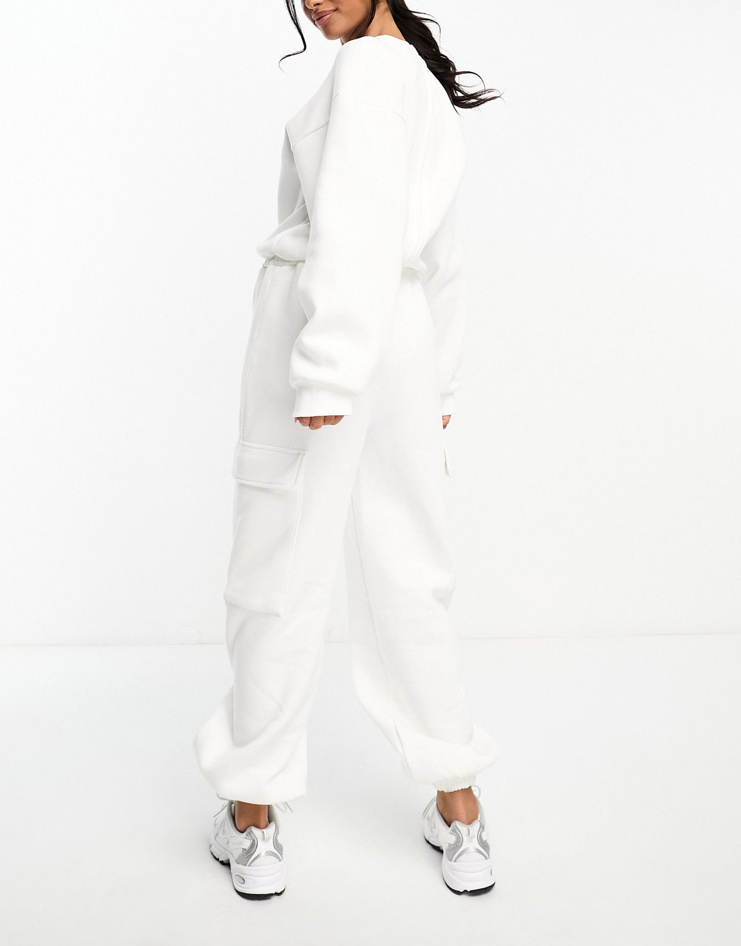 ASOS DESIGN oversized sweat jumpsuit with pockets in cream