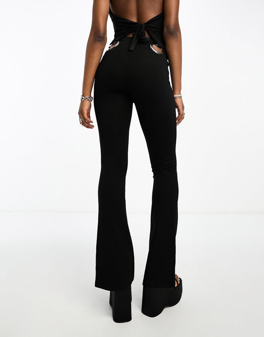 The Kript low rise flare trousers with hardware hip detail co-ord