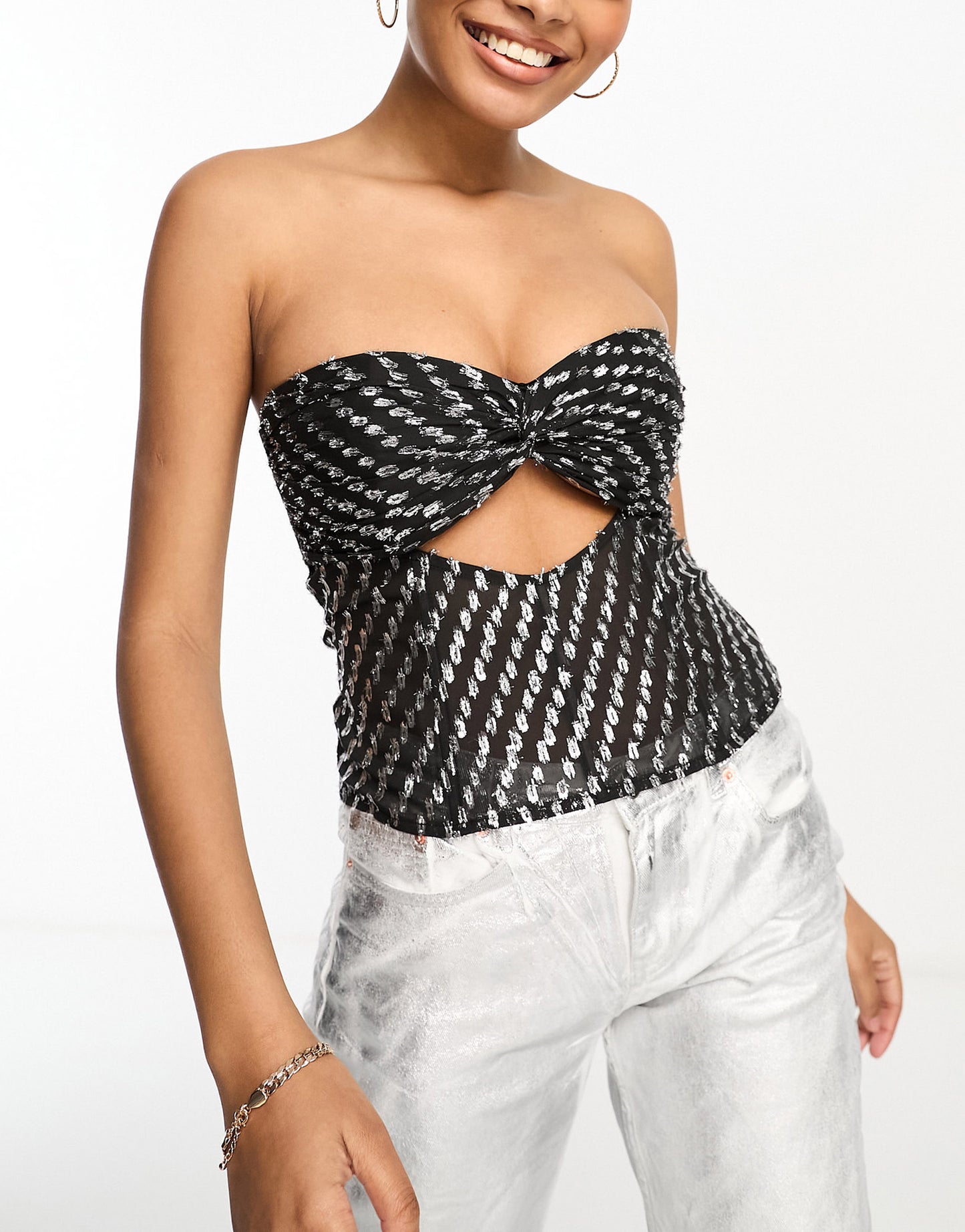 ASOS DESIGN boned corset with cut out in spot jacquard