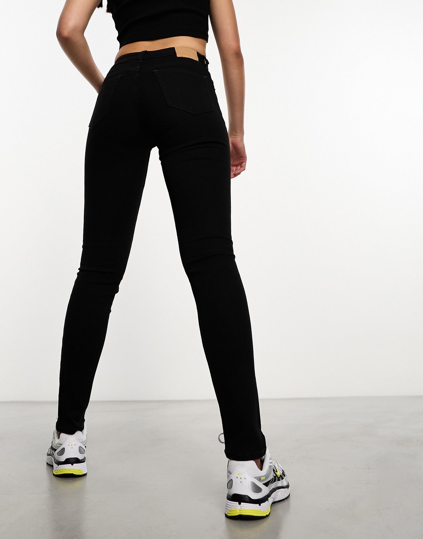 Weekday Spare mid waist skinny jeans in black