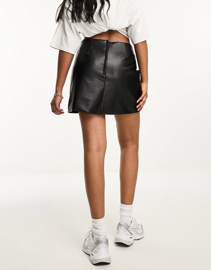 Monki leather look mini skirt in black