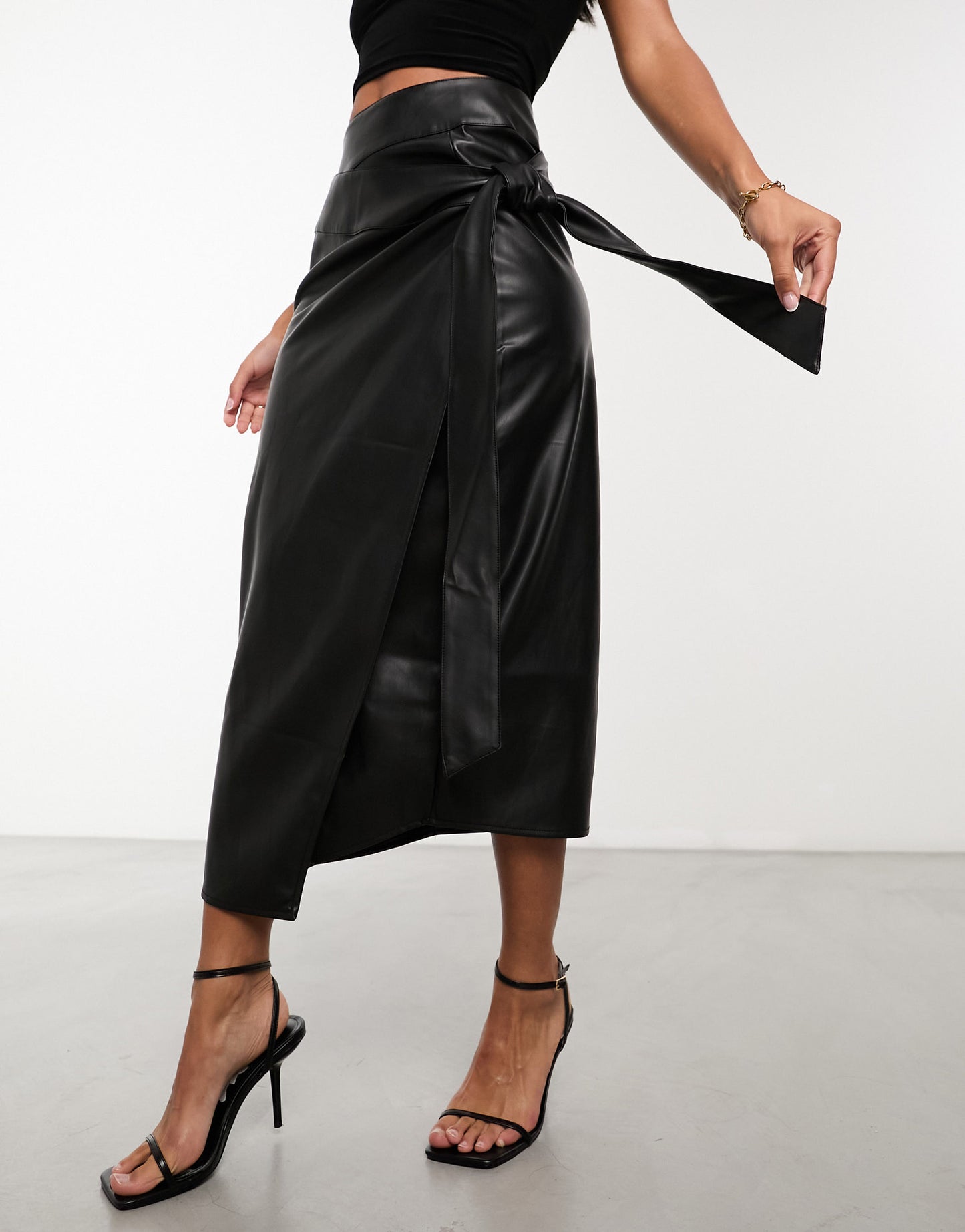 Never Fully Dressed PU wrap midi skirt in black