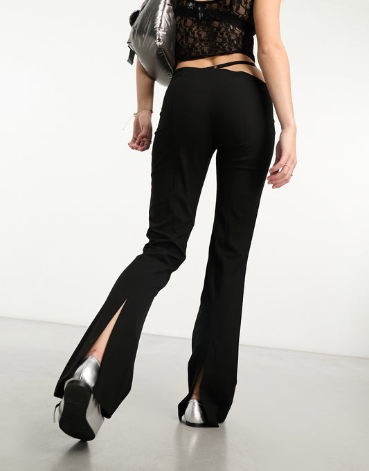 Weekday Aline flared trousers with asymmetric cut out waist detail in black