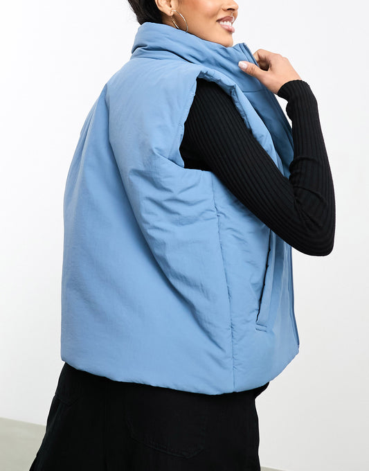 Karl Kani OG puffer gilet in dusty blue with wazy zip detail